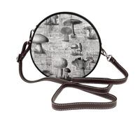 Sac à bandoulière rond en cuir vintage champignons sur journal pour femme