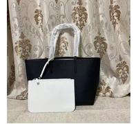 Sac cabas réversible pour femme avec pochette amovible - peut se porter à l'épaule ou à la main. Ce sac réversible séduit par son design classique et sa pochette intérieure amovible qui crée un contra