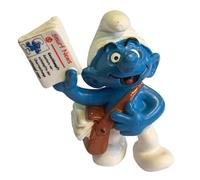 Schleich Figurine Les Schtroumpfs - Le Schtroumpf Vendeur de journaux (20458)