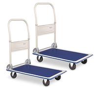 Set de 2 chariots pliables Stagecaptain Platformer, surface caoutchouc, protection bord gommée, poignée pliable 90° avec commande pied, 4 roues, charge max 150 kg.