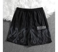Short ample pour hommes avec imprimé lettres de feu, taille avec cordon de serrage, motif graphique, noir pour sortie, short graphique noir, short streetwear pour hommes, short noir à flammes pour hom