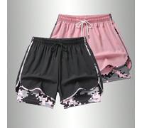 Shorts d'été décontractés et sportifs pour femmes avec une taille élastique à cordon de serrage et des poches intérieures. Les shorts présentent un design bicolore unique, leur donnant un look plus él