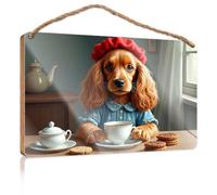 Signs and Plaques A Dog Dressed in A Blue Dress with Buttons, Sitting At A Table with A Cup of Tea and Cookies Hanging Wall Decor Sign for Home Decor (23 x 35 cm)