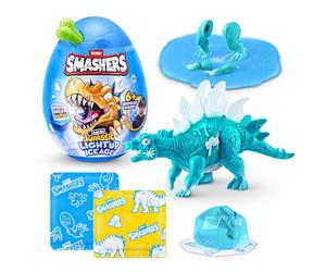 Smashers Mini Jurassic Light Up Dino Ice Age Œuf (Stégosaure) de ZURU - Jouet Dinosaure Cassable avec 6+ Surprises, Slime & Slime Cube de Glace, Dino Lumineux pour Enfants 3+
