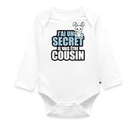 Spreadshirt J'ai un secret je vais être cousin Body Bébé Bio Manches Longues, 74 (6-9 mois), blanc
