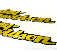 Stemma autocollant compatible avec les modèles Harley, Dyna Street Bob, lot de 2 autocollants en résine, effet 3D. Pour RÉSERVOIR ou CASQUE. (or)