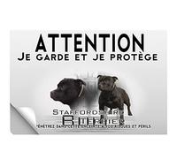 Stick Attention au chien staffie noir