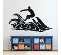 Sticker mural en vinyle représentant la silhouette d'un garçon surfeur sur une vague, idéal pour la décoration intérieure d'une chambre de garçon.
