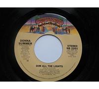 Summer, Donna - Summer, Donna Dim All The Lights 7" Casablanca NB2201 EX 1979 US pressing with machine cut centre.