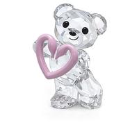 Swarovski Figurine Ourson Una Ourson Kris révélant des cygnes Swarovski entrelacés formant un cœur rose, en cristal