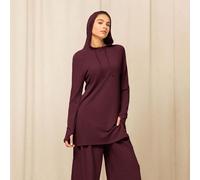 Sweat-shirt sans couture à manches mi-longues avec trous pour les pouces, ourlet fendu, impact moyen, pour l'entraînement, la course, la gym, l'activité quotidienne. Matière ultra-douce et sans coutur