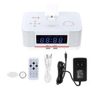 Système audio Bluetooth blanc, deux ports de chargement USB, radio FM avec 30 stations préréglées, entrée stéréo 5 mm et lecteur CD intégré.