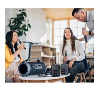 Système de microphone sans fil avec anti-hurlement et réverbération
