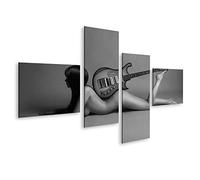 Tableau sur toile Belle jeune femme avec guitare noir et blanc - Toile 150x80 cm - 4 panneaux