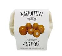 Tanner le petit marchand pommes de terre à couper dans des sacs en coton