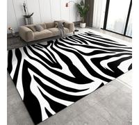 Tapis à motif à rayures zébrées, tapis de chambre moderne courbé noir et blanc, sous-tapis à texture douce qui ne perd pas ses poils, adapté à la maison et aux animaux domestiques, chambre d'enfant