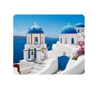 Tapis de souris gaming représentant une vue panoramique des maisons blanches traditionnelles des Cyclades et des dômes bleus du village d'Oia, sur l'île de Santorin, en Grèce. Tapis de souris antid