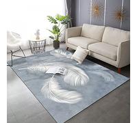 Tapis moderne à poils courts antidérapant et lavable avec plumes blanches sur fond bleu clair 200 x 250 cm pour salon et décoration d'intérieur