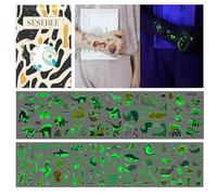 Tatouages Lumineux pour Enfants : 200 Styles (20 Feuilles) Autocollants de Tatouage Temporaire Lumineux Espace et Éclairage - Amusant et étanche pour Cadeaux Filles et Garçons