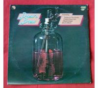 Taylor, Drew - Taylor, Drew Drew's Brew LP One Up OU2175 EX/VG 1977 Sleeve is graded VG because it has ring marks to front and rear. The vinyl is near mint.