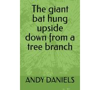 The giant bat hung upside down from a tree branch