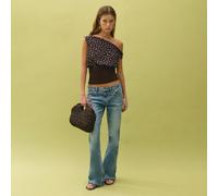 Top à pois avec un overlay en mousseline drapé et un ourlet côtelé ajusté. À porter avec un jean ou une jupe pour les sorties. Parfait pour le jour au soir, le printemps, l'été, l'automne, les fêtes, 