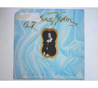Tyson, Sylvia - Tyson, Sylvia Woman's World LP EMI EST11434 EX/VG 1975 Sleeve has heavy sticker damage on front (6cm x 12cm) and on rear (4cm x 6cm). Sleeve is snipped at top left corner. There is factory sample sticker on side two label.