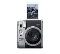 Un Appareil Photo instantané Instax Mini 99, avec Effets Couleur, contrôle de luminosité, Modes Paysage/Normal/Macro, utilise la pellicule Instax Mini. Finition argentée