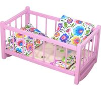 Un lit de poupée en bois, un berceau rose avec des draps au motif Lowicz et un matelas