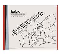 Un piano avec une maison dedans