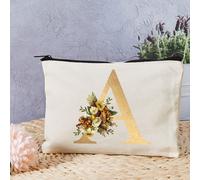 Un sac de rangement pour le maquillage simple et agrandi avec une fermeture éclair et des motifs de lettres dorées, qui peut également être utilisé comme un sac de toilette multifonctionnel (direction