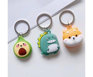 Une jolie housse de protection en silicone style dessin animé compatible avec Apple Airtag petit dinosaure,avocat,chien,football,fraise,Patte de chat,citron,Fesses de Corgi,Briquettes,basket-ball,caro