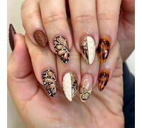 Œuvre de faux ongles avec motif écaille de tortue | Papillon pailleté, forme amande, finition prête à être photographiée pour les fêtes