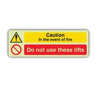 V Safety Panneau phosphorescent avec inscription « Caution In The Event Of Fire Do Not Use These Lifts » Format paysage 750 x 250 mm Fabriqué en Grande-Bretagne