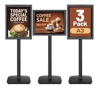 VAIIGO Lot de 3 Porte Affiche A3 robuste sur Pied - Base fonte lestée, Rotation 360°, Cadre Clipsable - Présentoir Panneau Affichage Extérieur - Pour Avis, Publicité, Porte Menu Restaurant | Noir