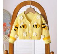 Vêtements pour bébé fille, décontractés, à la mode et mignons. Ils sont jaunes avec des fleurs et des décorations d'abeilles. Il s'agit d'un pull tricoté à manches longues et d'un cardigan. Ils sont d