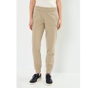 Vêtements Puma W Better Ess Pants Fl pour Accessoires M Beige