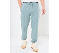 Vêtements Puma WARDROBE ESS Relaxed Sweatpants TR cl pour Accessoires M Vert
