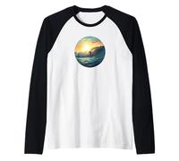 Vie océanique. Catching Waves, Surfer Manche Raglan