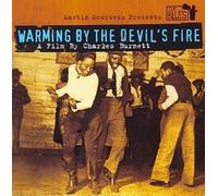 Warming by The Devils Fire [Import]