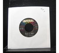 What A Price/Ain't That Just Like A Woman (NM 45 rpm)