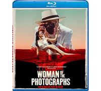 WOMAN OF THE PHOTOGRAPHS