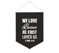 Yelolyio Drapeau mural en toile avec citation inspirante « We Love Because He First Loved Us ». 1 John 4:19 Bannière murale à suspendre pour la maison ou le bureau 30,5 x 40,6 cm