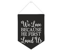 Yelolyio Drapeau mural en toile avec citation inspirante « We Love Because He First Loved Us » - Bannière à suspendre - Décoration de maison ou de bureau - 25,4 x 30,5 cm - Cadeau de pendaison de