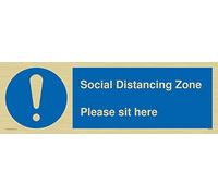 Zone de distance sociale S'il vous plaît asseyez-vous ici